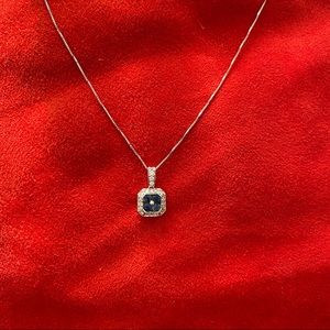 14kt white gold,sapphire and diamond necklace.